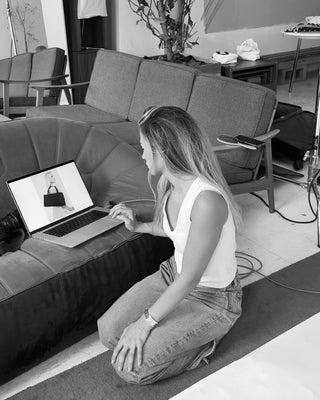 Cass the founder behind the scenes at a photoshoot